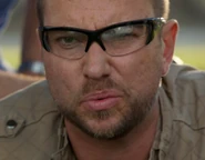 Mickic misses his shot as he is stabbed