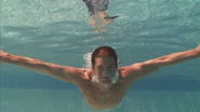 Dexter swims in pool S5E2