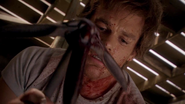 Dexter spattered with Rankin's blood 13