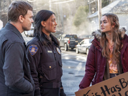 Jim (Dexter), Angela, and Audrey at protest