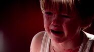 Dexter as a child during Shipping Yard Massacre