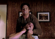 Dexter strangles Nathan