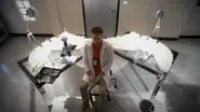 6x05 -Dex and wings.webp (58 KB) Dexter examines the angel's wings