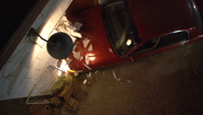 Quinn rams his car into the door