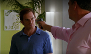 Isaak holds gun on Dexter