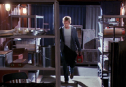 Dexter about to set fire to the shipping container