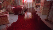 Brian spills his blood-buckets into Room 103 of the Marina View Hotel