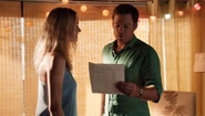 Hannah shows Dexter the travel itinerary