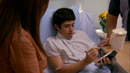 Jandro draws the tattoo on hand of Carlos Fruentes