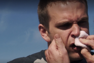 Dexter collects blood from Joe's nose