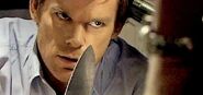 Dexter is tempted to stab Elliott Larson