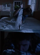 Dexter impales Yates through the bed he's hiding under