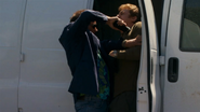 Dexter forced into van