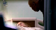 Doakes continues comforting Kara.