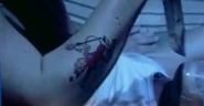 His tattoo seen in the snuff film - guilt confirmed