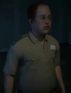 Jamie as he appears in the video game, having red hair instead of black