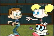 A terrified Beau watches as Dexter and Dee Dee reach out to him.