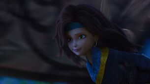 Zarina in a blue coat.