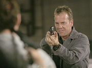 24- Jack Bauer (Kiefer Sutherland) on Season 4 cornering Mandy holding Tony Almeida hostage