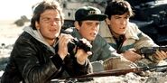 C. Thomas Howell, Powers Boothe (unpictured) and Charlie Sheen in Red Dawn