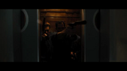 Bobby fires at the guards.