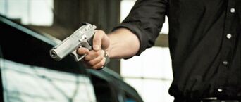 Thomas Gabriel aims his Jericho 941 at John McClane