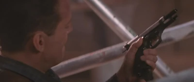 McClane reloads his empty Beretta.