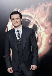 247880-cast-member-josh-hutcherson-poses-at-the-premiere-of-the-hunger-games-