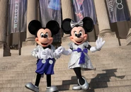 Mickey and Minnie in their 100 Years of Wonder costumes at the Franklin Institute in 2023