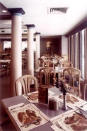 The dining room of a San Jose, California location, 1991 (said style was used from 1990-2010)