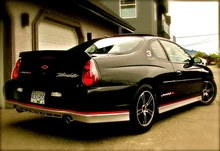 A rear-right three quarter view of a 2002 Dale Earnhardt Edition Monte Carlo SS.