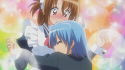 A surprised Maria having Hayate trip and land on her