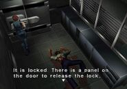 It is locked. There is a panel on the door to release the lock.