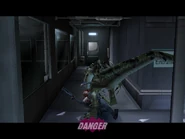 The Velociraptor breaks the window to attack Regina.