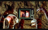 Screenshot 2019-09-08-21-22-41.png (1.53 MB) Dinosaurs watch Gary Owens & Eric Boardman on a TV.