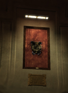 A rune hanging above the fireplace in Campbell's meeting room.