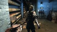 An Overseer aims his pistol at Corvo.