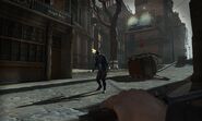 A City Watch Guard searches for Corvo in an early screenshot.