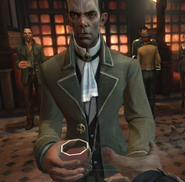 Pendleton hands Corvo a drink.