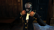 Wiles Roland, an aristocrat in a mask, fixes his jacket.