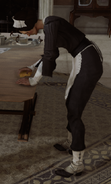 A servant cleaning a table in Stilton Manor.