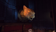 One of that cat's head sculpture in the Golden Cat.