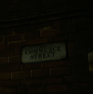 A sign for Commerce Street, close-up.