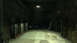 The front of the bunkroom with the safe in the far right corner.