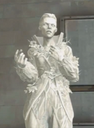 Delilah's statue talking to Daud.