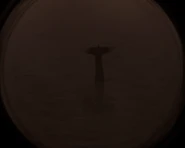 The same whale, diving.