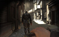 Corvo sneaking up behind a guard.