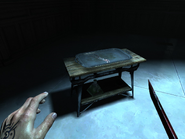 A tray with pliers in the interrogation room.