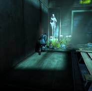 A witch speaks to a statue of Delilah in the Drapers Ward Sewer System.