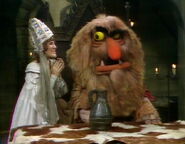 Sweetums being serenaded by Ruth Buzzi.